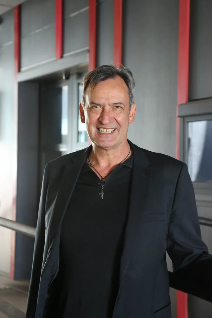 Shane Gaskin, Chief Information Officer at NZQA, is featured in a formal portrait. His name and title appear on a green background, suggesting an official corporate or organizational setting intended for professional use.